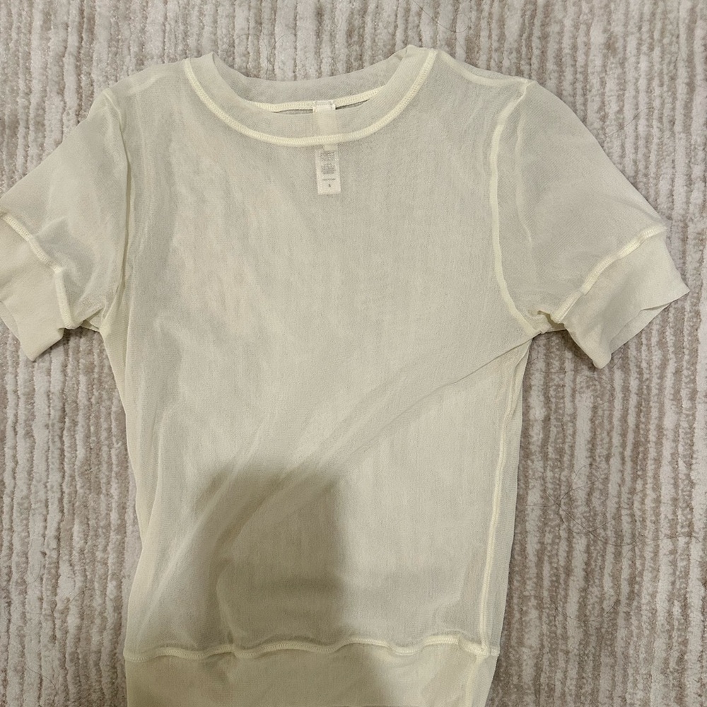 Sheer cream top
